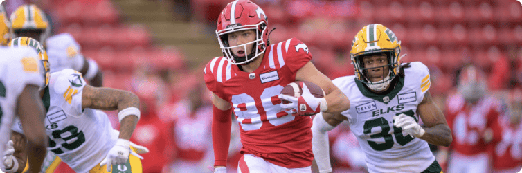 Battle of Alberta CFL players in Action